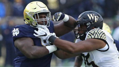 Jay Hayes (left) as a member of the Notre Dame Fighting Irish during the 2017 game against Wake Forest. (Photo by Jonathan Daniel/Getty Images)