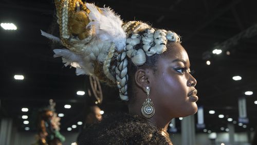 08/05/2018 -- Atlanta, Georgia -- A Fantasy hair model shows off her hairstyle during the competition at the Spring 2018 Bronner Brothers International Beauty Show at the Georgia World Congress Center in Atlanta, Sunday, August 5, 2018.  (ALYSSA POINTER/ALYSSA.POINTER@AJC.COM)