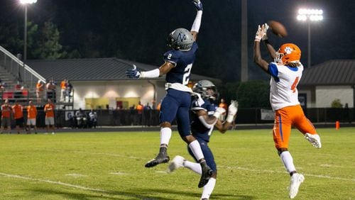Norcross' Jaytwon Peoples (2) blocks a pass intended for Parkview's Bryce Fleetwood (4) during Friday's game. (Rebecca Wright/For the AJC)