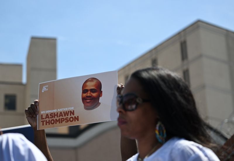 Supporters for Lashawn Thompson’s family rally outside the Fulton County Jail, Thursday, April 20, 2023, in Atlanta. Lashawn Thompson, 35, was discovered unresponsive in the jail’s psychiatric wing covered in bed bugs in September, according to a Fulton County Medical Examiner report. His body showed no obvious signs of trauma and the cause of death was undetermined, the report said, noting a “severe bed bug infestation” in the jail. (Hyosub Shin / Hyosub.Shin@ajc.com)