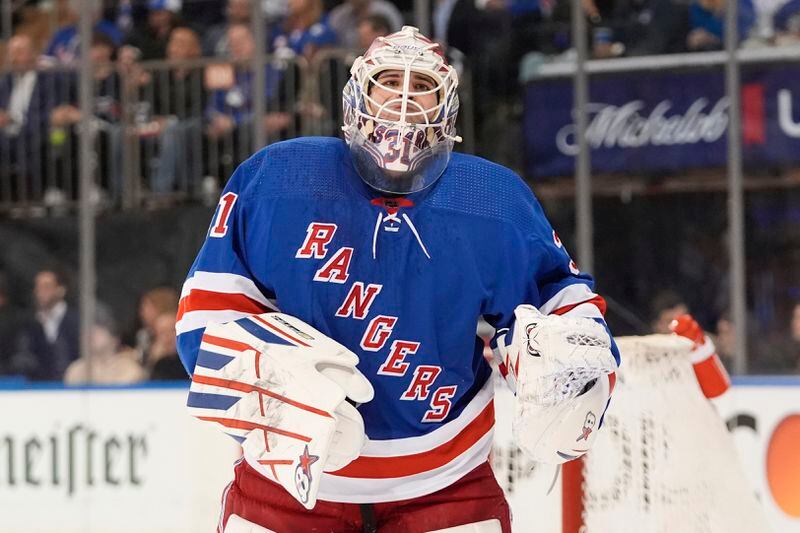 New York Rangers goaltender Igor Shesterkin (31) reacts after Washington Capitals' Connor McMichael scored a goal during the first period in Game 2 of an NHL hockey Stanley Cup first-round playoff series, Tuesday, April 23, 2024, in New York. (AP Photo/Frank Franklin II)